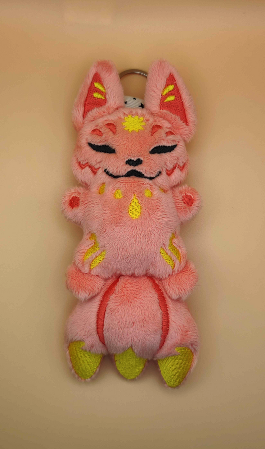 Kitsune rose avec accroche