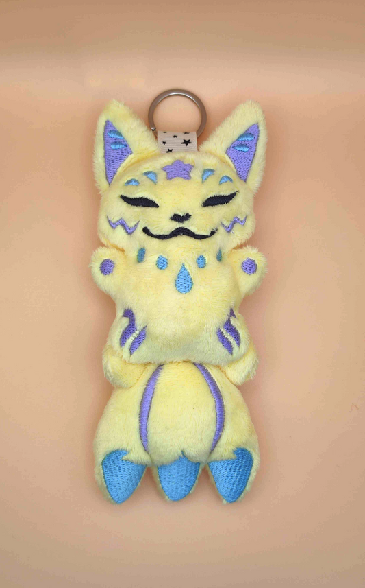 Kitsune jaune avec accroche