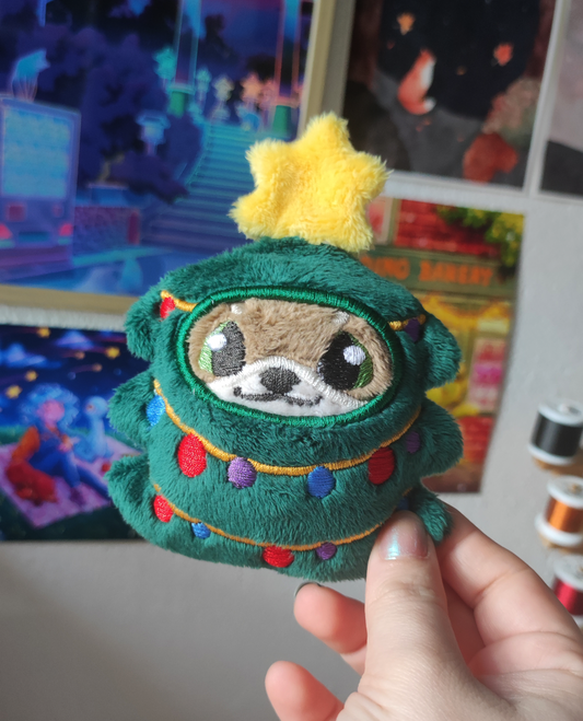 Loutre et son costume festif | Sapin