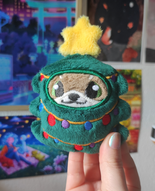 Loutre et son costume festif | Sapin